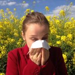 girl sneezing allergy pollen girl sneezing