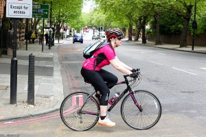 woman on sport bycicle