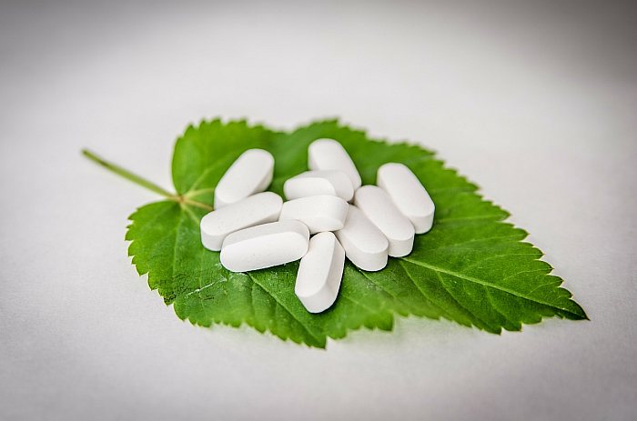 medications on green leaf