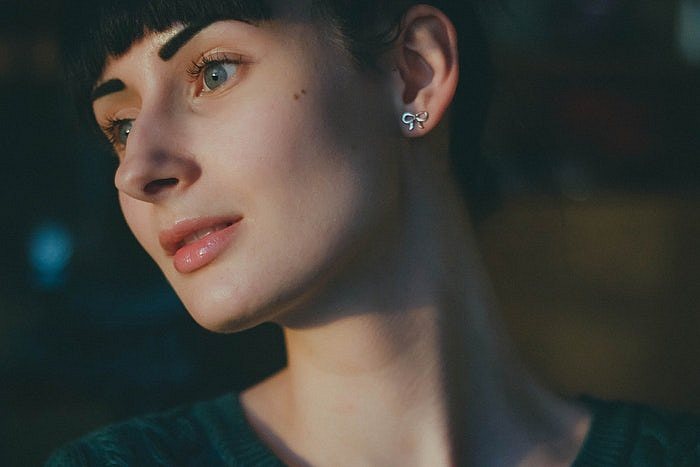 woman ear earrings