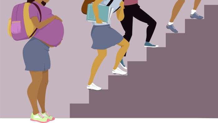 School pregnant girl on stairs