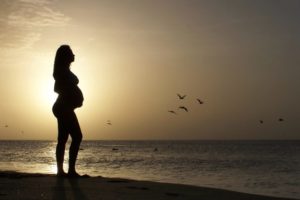 young pregnant woman silhouette
