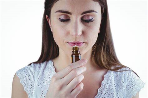 smelling essential oil