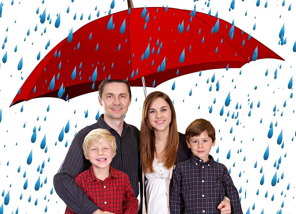 family under umbrella